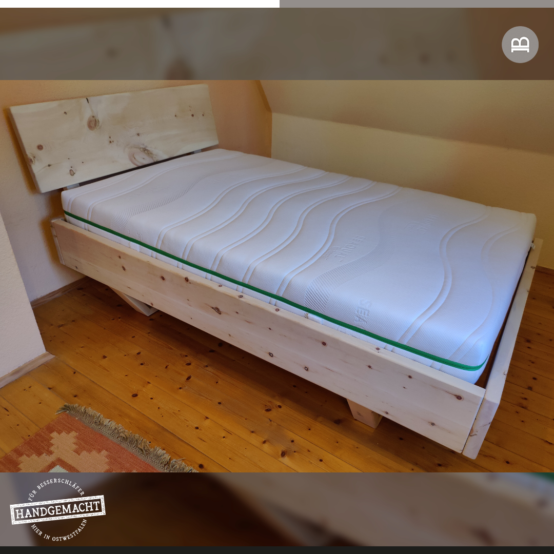 Zirbenholz-Bett mit einem einteiligen Kopfteil in 120x200cm